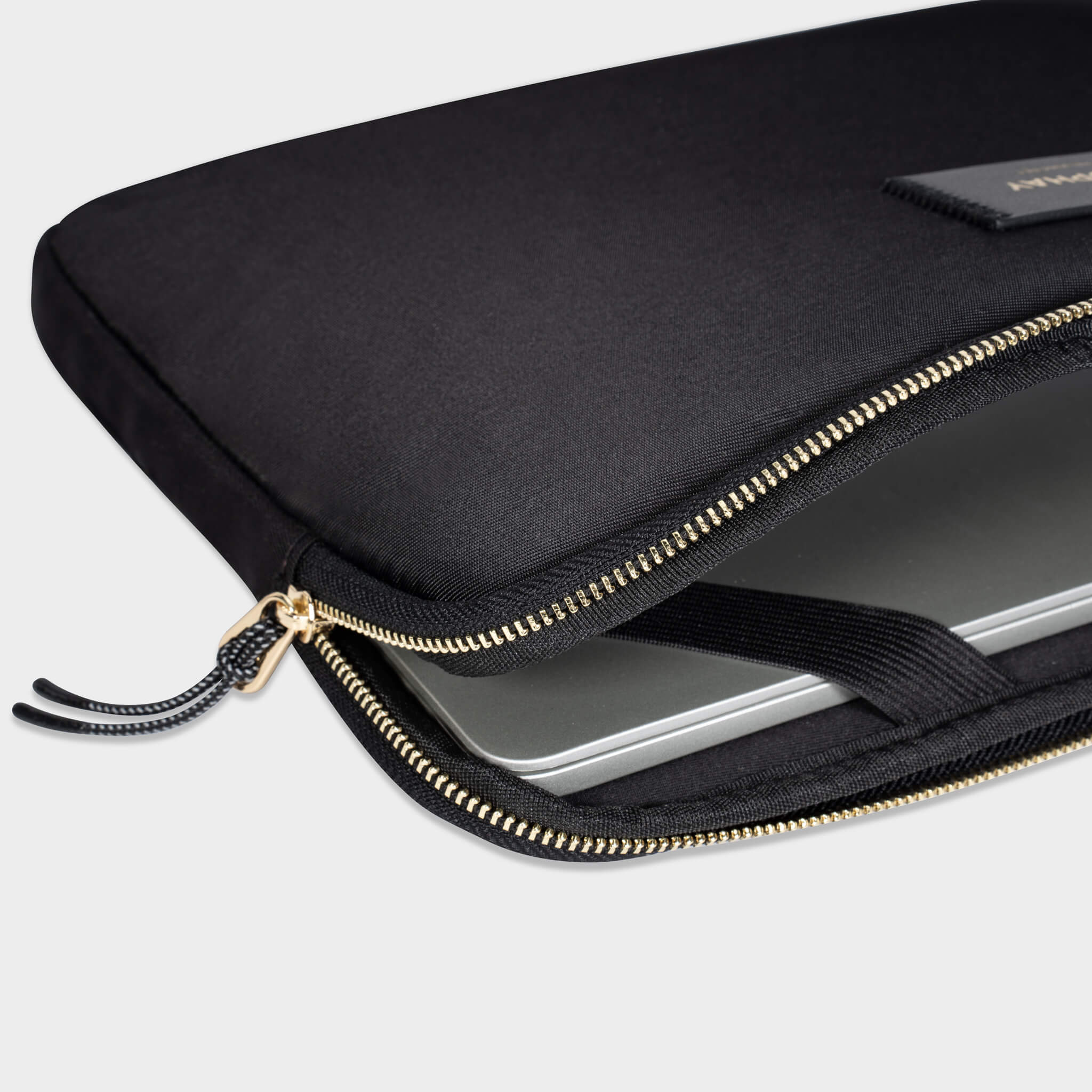 Ecophay black laptop sleeve with open zipper and device