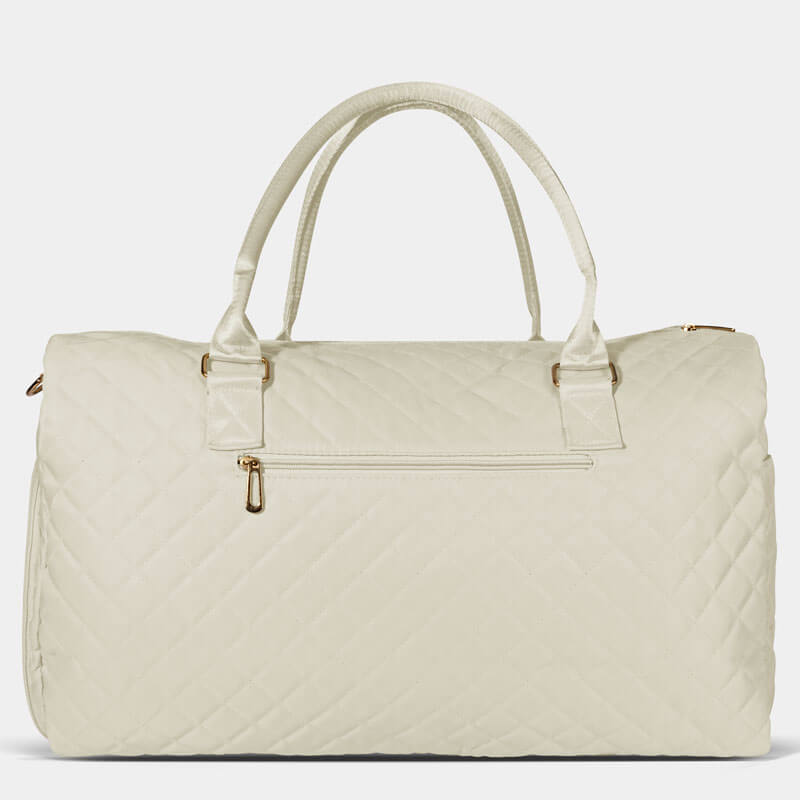Existing quilted duffle structure with top zip and carry handles